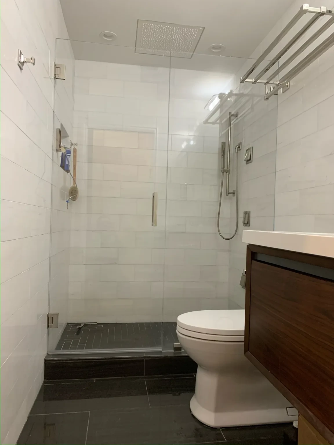 Finished modern bathroom with glass shower